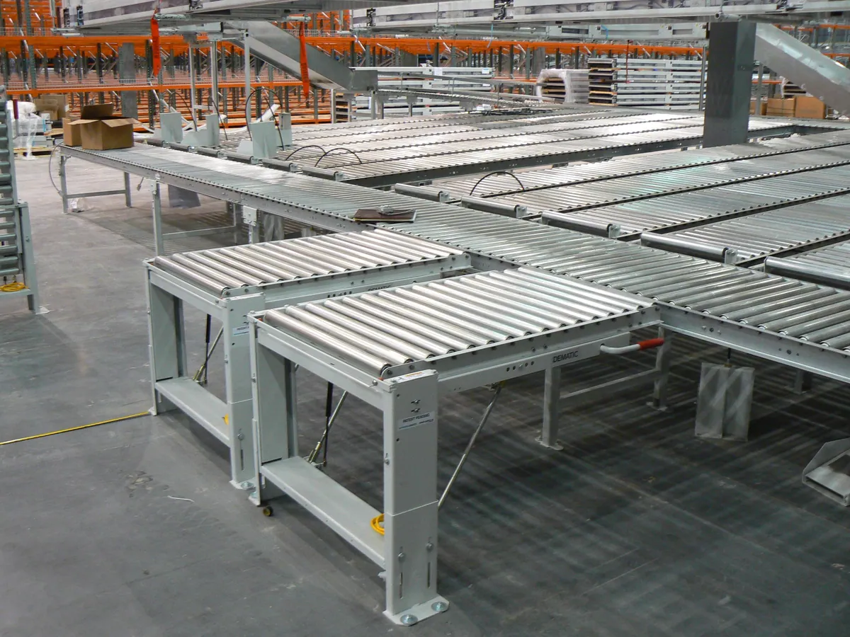 Roller conveyor sections inside a warehouse